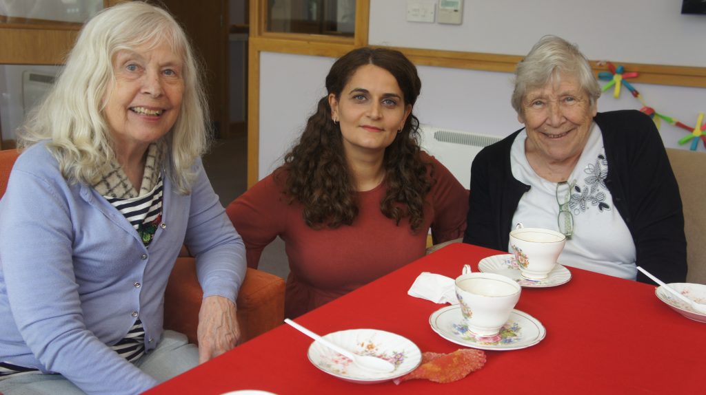 residential care homes- breakfast with elderly woman